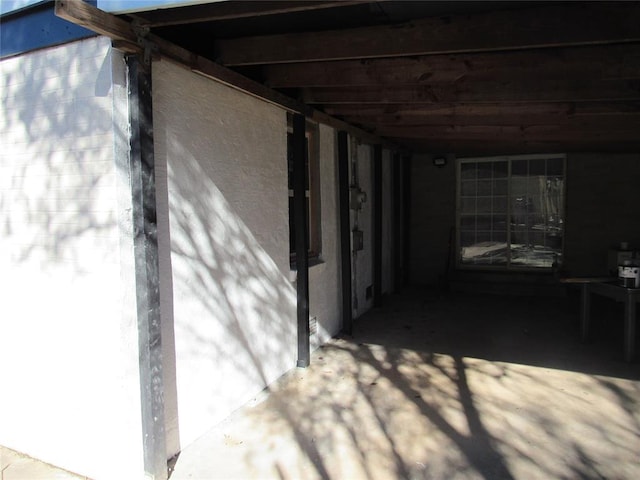 view of patio / terrace with a carport