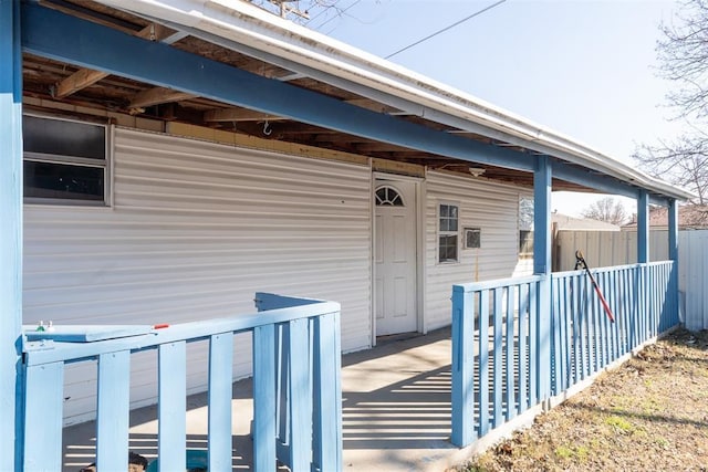 entrance to property with a deck