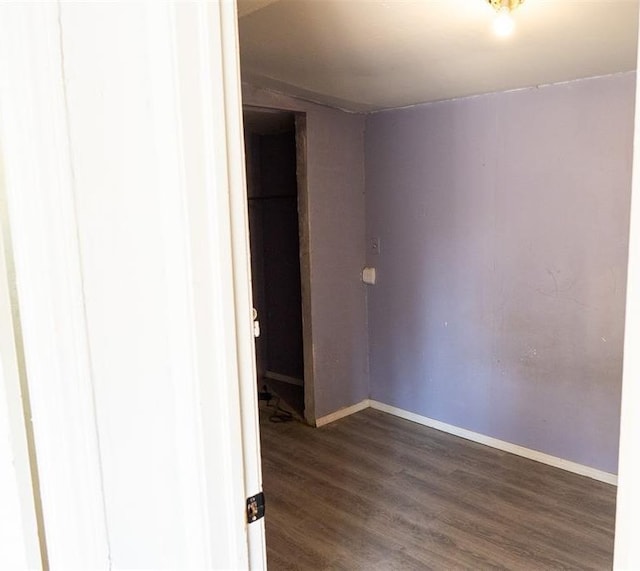 empty room featuring dark hardwood / wood-style floors