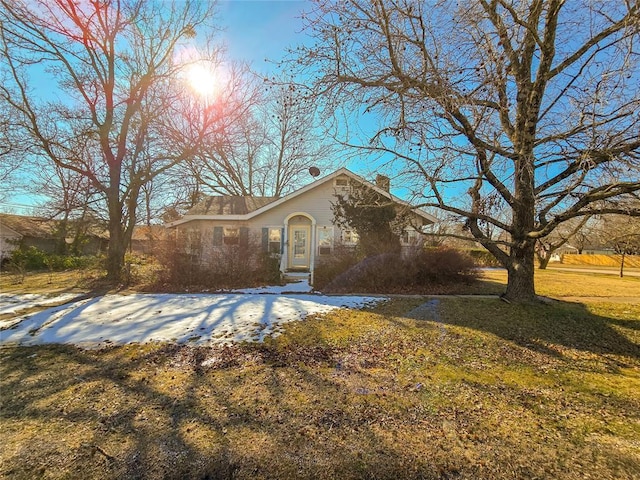 ranch-style house with a front yard