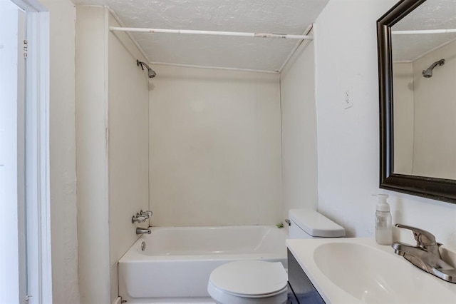 full bathroom featuring vanity, a textured ceiling, shower / tub combination, and toilet