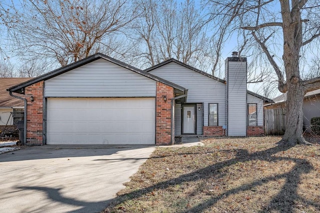 single story home featuring a garage