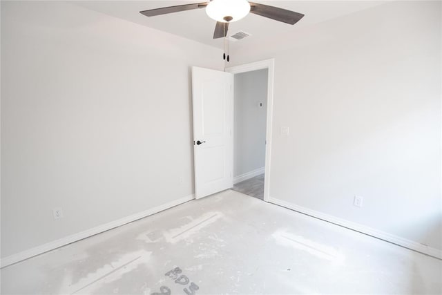 8108 NW 154th St, Edmond, OK 73013 - empty room with ceiling fan, baseboards, and concrete flooring
