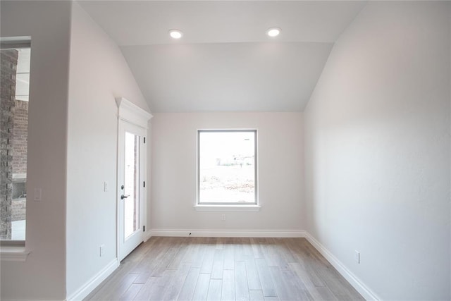8108 NW 154th St, Edmond, OK 73013 - unfurnished room featuring lofted ceiling, light wood-style flooring, and baseboards