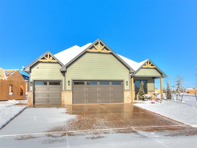 craftsman-style house featuring a garage