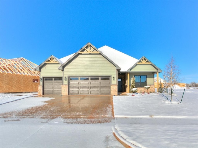 craftsman house with a garage