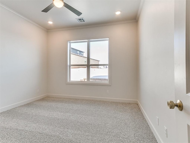 unfurnished room with carpet floors, ornamental molding, and ceiling fan