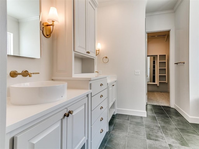 bathroom featuring vanity and ornamental molding