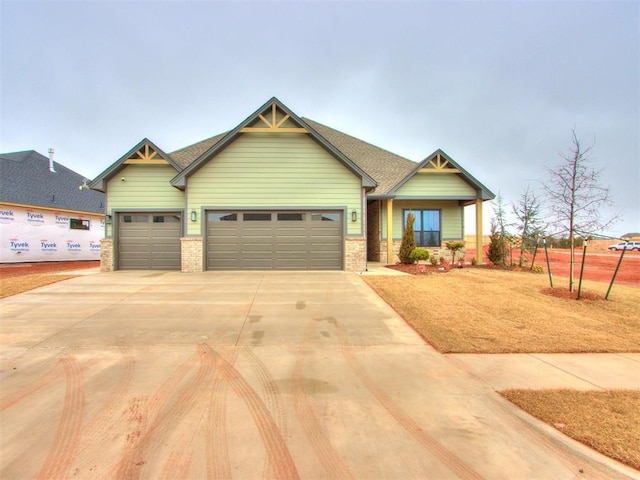 craftsman-style house featuring a garage