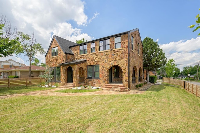 view of front of house with a front lawn