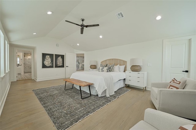 bedroom featuring ceiling fan, light hardwood / wood-style flooring, and vaulted ceiling