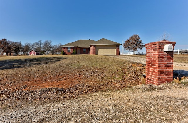 single story home featuring a garage