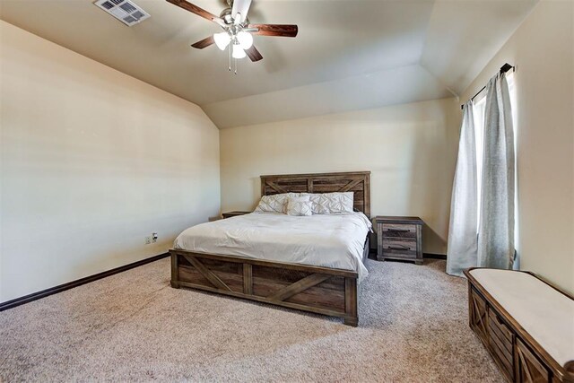 carpeted bedroom featuring ceiling fan and lofted ceiling