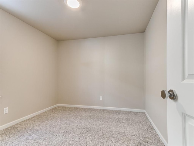 spare room featuring carpet floors