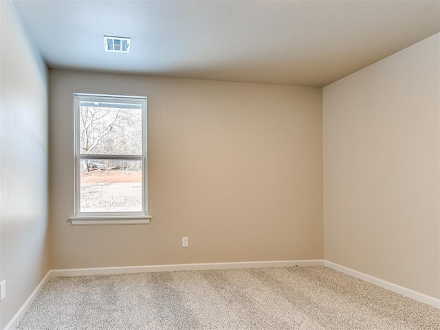 view of carpeted spare room