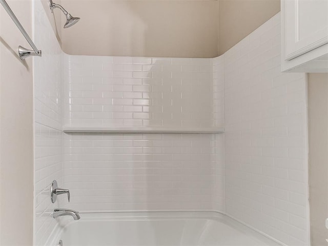 bathroom with shower / tub combination