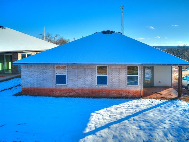 view of snow covered property