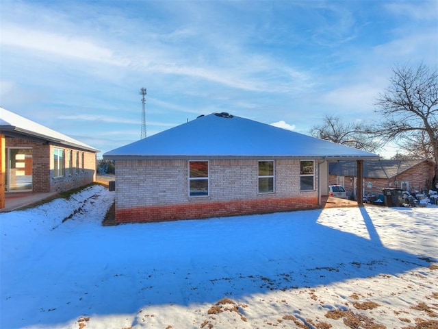 view of snow covered property