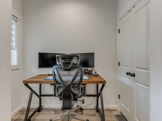 office area featuring light hardwood / wood-style flooring