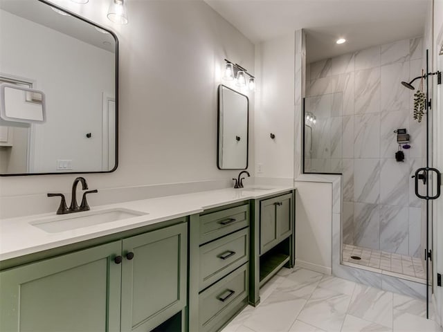 bathroom with vanity and an enclosed shower