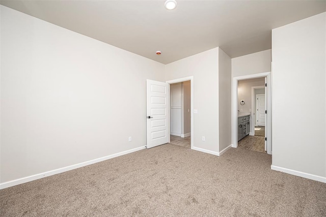 1127 Deer Rdg, Tuttle, OK 73089 - unfurnished bedroom with light colored carpet and baseboards