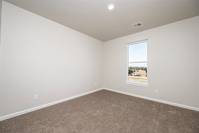 1127 Deer Rdg, Tuttle, OK 73089 - spare room with dark colored carpet and recessed lighting