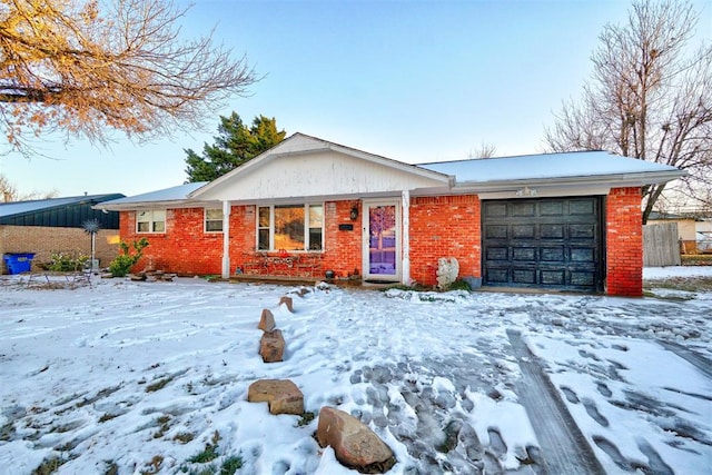 single story home featuring a garage