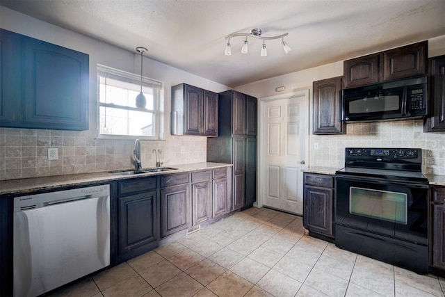 kitchen with light tile patterned floors, black appliances, backsplash, dark brown cabinets, and sink