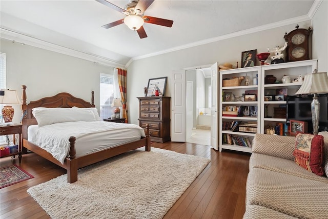 bedroom featuring connected bathroom, ceiling fan, dark wood-type flooring, and lofted ceiling