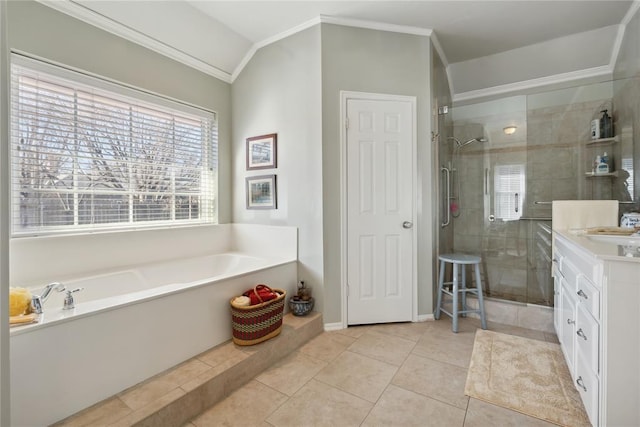 bathroom with tile patterned flooring, plus walk in shower, and ornamental molding