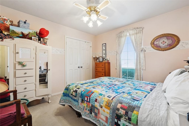 bedroom with carpet, a closet, and ceiling fan