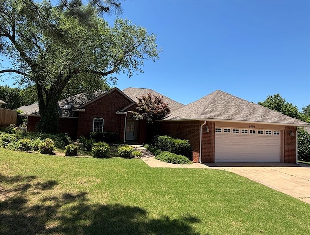 1401 Carrick Ct, Edmond, OK 73034 - ranch-style home with brick siding, a garage, a front lawn, concrete driveway, and roof with shingles