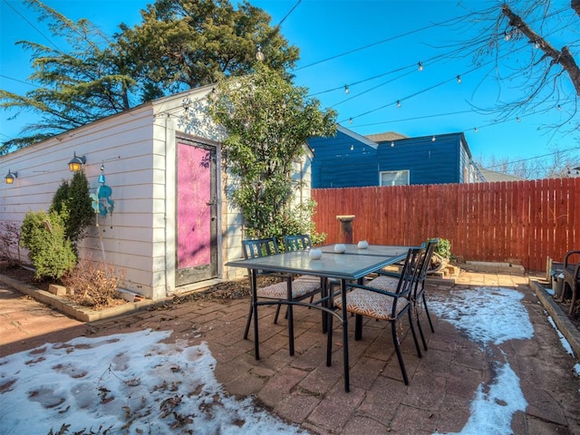 view of patio with an outdoor structure