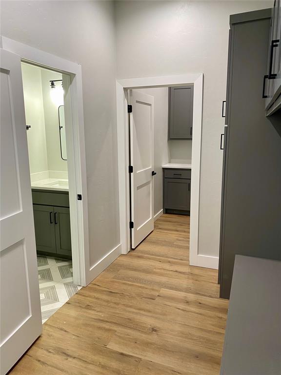 36120 Prairie Rdg, Shawnee, OK 74804 - corridor featuring light wood-type flooring and baseboards