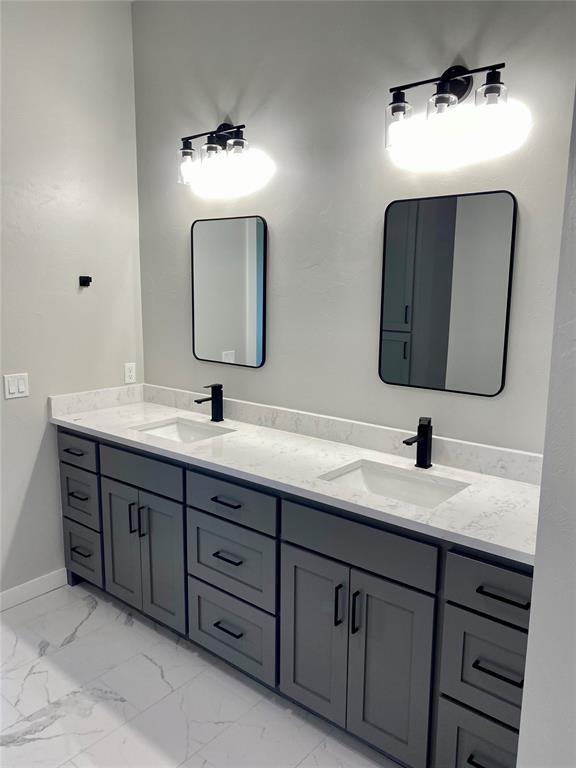 36120 Prairie Rdg, Shawnee, OK 74804 - full bath with double vanity and marble look tiles