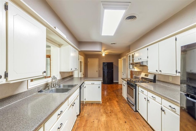 kitchen with ceiling fan, sink, white cabinetry, and appliances with stainless steel finishes