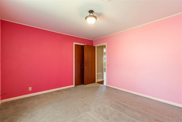 spare room with carpet flooring