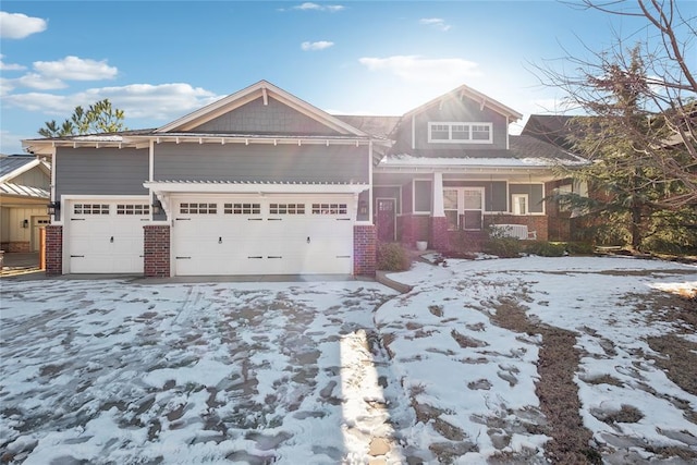 craftsman-style home with a garage