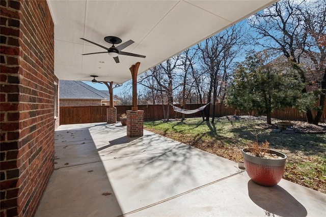 view of patio / terrace featuring a fenced backyard and a ceiling fan