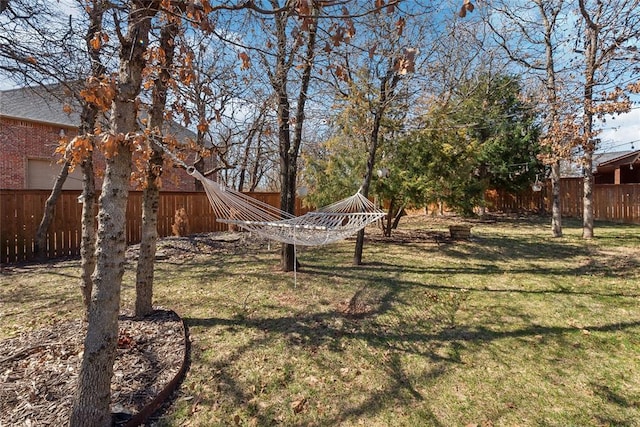 view of yard featuring fence