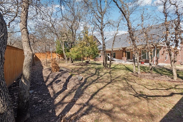 view of yard with fence