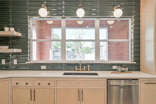 kitchen with sink, light brown cabinets, backsplash, and dishwasher