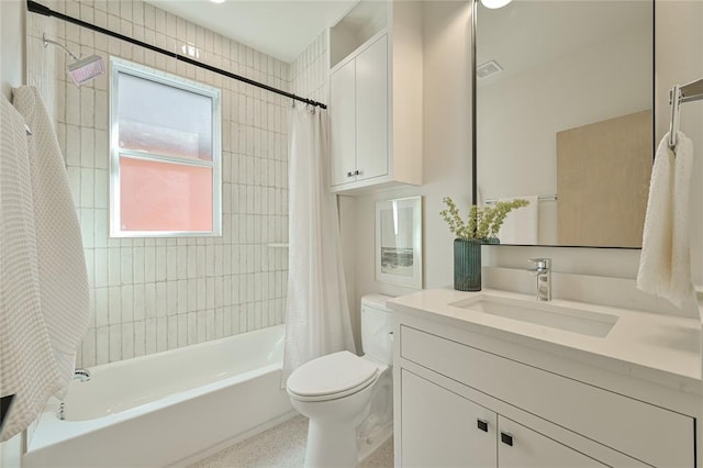 full bathroom with toilet, vanity, and shower / tub combo with curtain