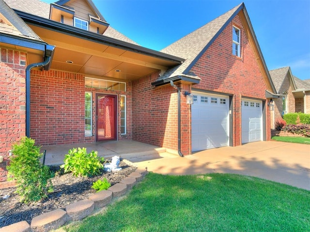 view of front of home featuring a garage and a porch