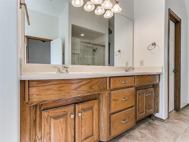 bathroom featuring walk in shower and vanity