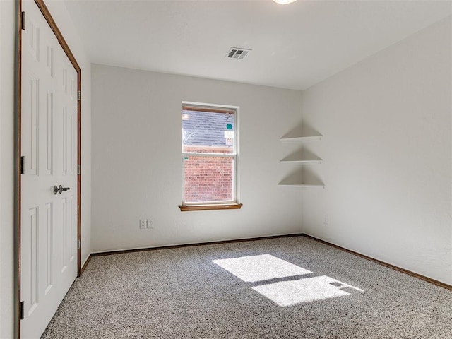 view of carpeted spare room