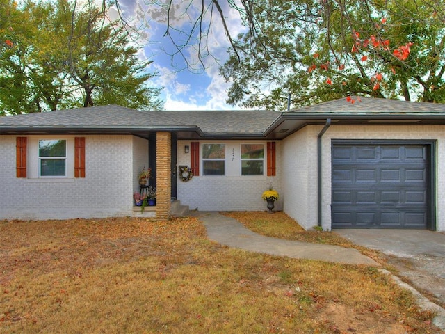 ranch-style home with a garage