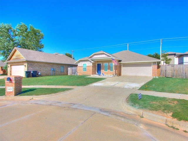 ranch-style home featuring a front yard and a garage