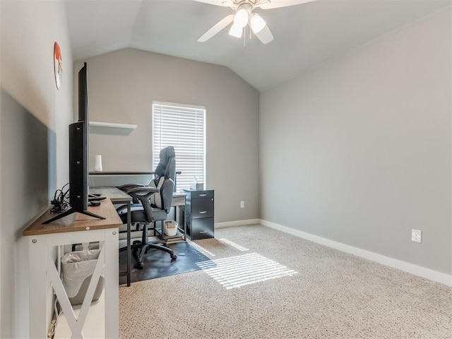 office featuring ceiling fan, vaulted ceiling, and carpet flooring