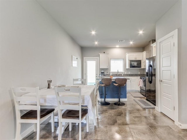 dining room with sink